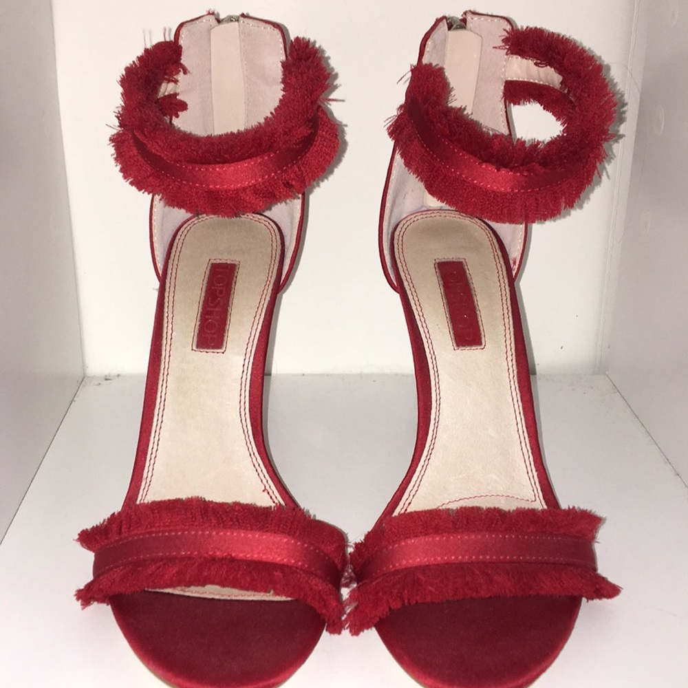 Top shop; red high heels with zippers in the back.
